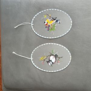 Etched oval glass of birds on tree limb with flowers